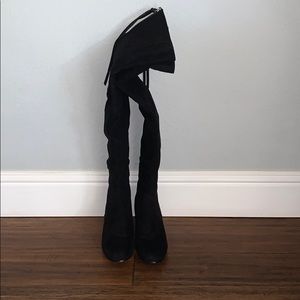 Thigh high black boots